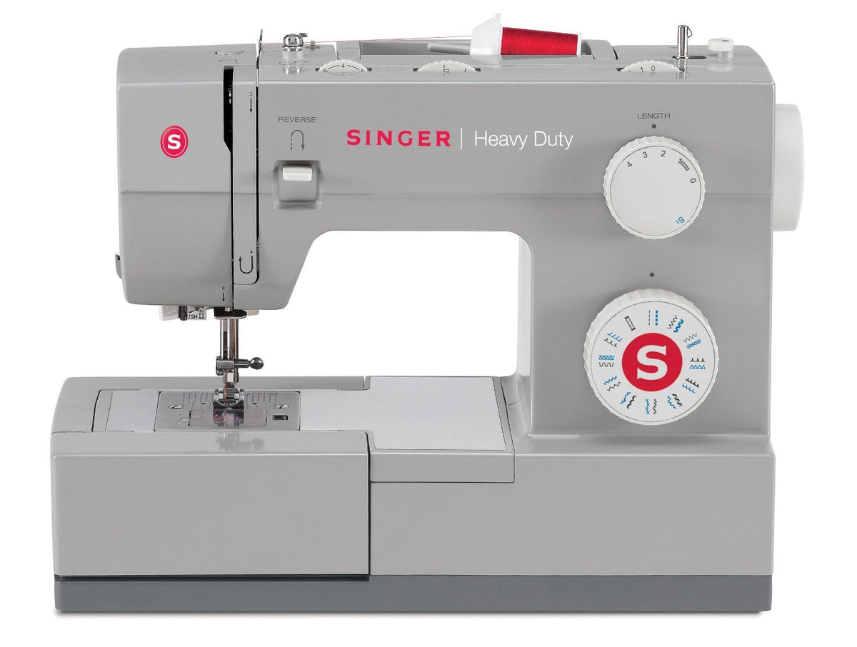 White SINGER Heavy Duty 4423 sewing machine with accessory tray