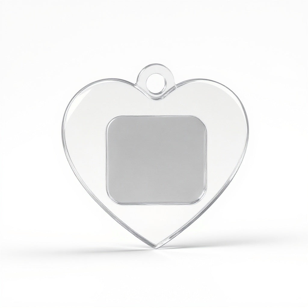 Close-up of clear acrylic material on heart-shaped keychain, macro texture shot