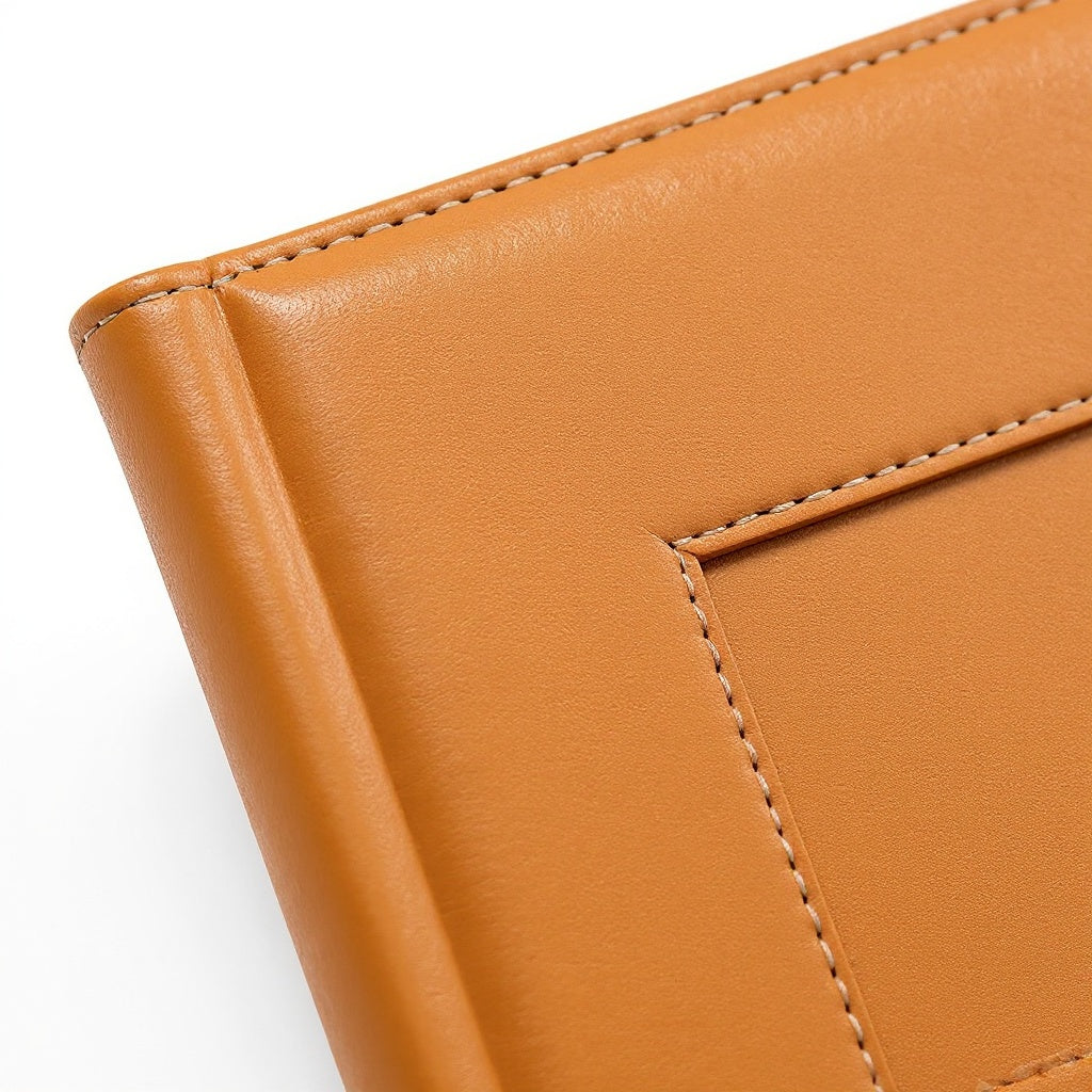 Close-up of premium leather texture on photo album, macro detail shot