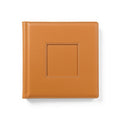 Hero shot of premium leather photo album on white studio background, full product visible